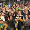 Australian fans celebrate after the Socceroos scored a second goal via Connor Metcalfe.