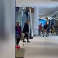 A 30-year-old man has been arrested and taken to hospital for assessment after allegedly carrying a knife around a shopping centre in Melbourne’s east.