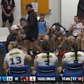 Brisbane coach Scott Prince sprays his NRLW team at half-time in a clash with Gold Coast.