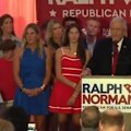 A room full of Republican die-hards has booed the mention of Donald Trump's name during Congressman Ralph Norman's concession speech.