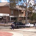 A lockdown has been lifted in Sydney's Inner West but police are still searching for an armed man.