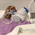 The victim of a savage dog attack in Brisbane is recovering in hospital, with the first pictures of Ajay Malik released since suffering life-threatening injuries.