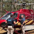 A Queensland aviation company owner will face court today after allegedly trying to smuggle two wanted men into Indonesia on a "black flight".
