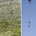 A South African police officer had to brave crocodile-infested waters of the Komati River to recover human remains.