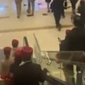 Social media videos show smoke filling the interior of Dubai's International Airport as airline staff evacuate the building.