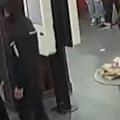 Police have released footage of a man they believe can help an investigation into an attack with a broken bottle.