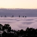 Several flights have been diverted and traffic is building up in Brisbane after the city was blanketed in thick fog this morning.