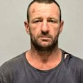 A body has been found in the search for alleged triple murderer Julian Ingram.