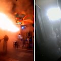 A huge fire engulfed a pub in Bangkok, killing at least 27 people before firefighters brought the blaze under control.