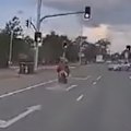 A motorobike rider is on the run after a collision with a car in Brisbane's Morayfield on Wednesday.