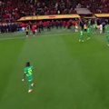 Senegal players leave the field in protest of a late penalty call in the Africa Cup of Nations final.