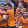 Wallaby No.1000 Massimo De Lutiis goes over as the home team extend their lead.