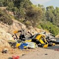 Two people have died in Greece after two firefighting helicopters owned by an Australian company collided.