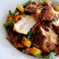 Inclusive: Entice's allergy-aware menu includes paprika chicken over a baby spinach salad.