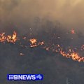 Some Perth residents have been hit with their second emergency warning in over a month as a bushfire threatens homes.