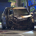 An arsonist has torched multiple government vehicles in a car park at Yatala Labour Prison.