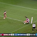 Blues halfback Jesse Southwell makes a try-saving tackle on Jasmine Peters.