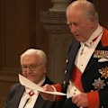 The King is right now hosting Germany's President and First Lady at a lavish state banquet in Windsor.