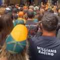 F1 fans celebrate Oscar Piastri's arrival in Melbourne, taken by Sam McClure.