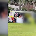 A 34-year-old man is fighting for his life after being pinned under a van in an alleged hit-run incident in Carlingford, Sydney.