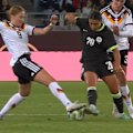Sam Kerr was in a lot of pain after going down with an ankle injury between Germany, but is able to get back on in the half.