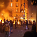Nearly 1000 people were arrested as hundreds of thousands took to the streets for mass protests across France.