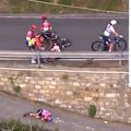 A number of riders are flung off their bikes in the San Remo race.