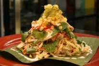 Coconut-grilled chicken with green mango salad and chilli jam