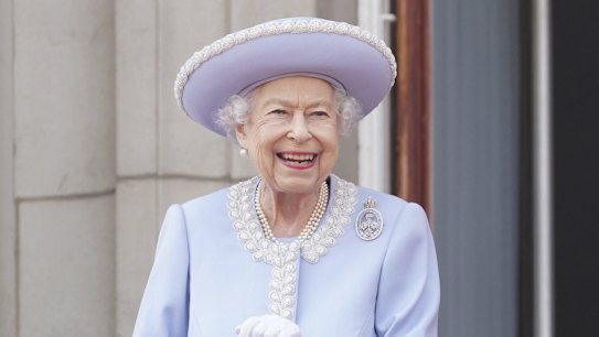 Queen Elizabeth II watches from the balcony during the Trooping the Color ceremony at Horse Guards Parade in London, Thursday, June 2, 2022, on the first of four days of celebrations to mark the Platinum Jubilee. The events over a long holiday weekend in the U.K. are meant to celebrate the monarchâs 70 years of service. (Jonathan Brady/Pool Photo via AP)