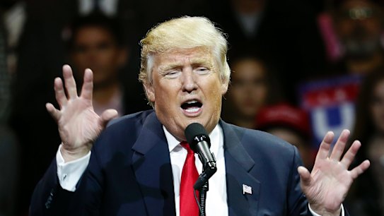 President Donald Trump says construction of the wall will begin within months.