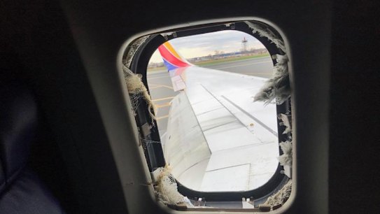 Passenger partially 'pulled out plane window' and forced to land in Philadelphia