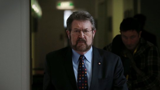Senator Derryn Hinch uses parliamentary privilege to name 'monster' cop who raped children over 16 years.