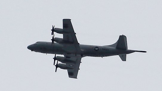 A US P3 Orion surveillance plane flying over Marawi, in the Philippines, earlier this month. Australia is expected to soon send P3 Orions to join the fight.