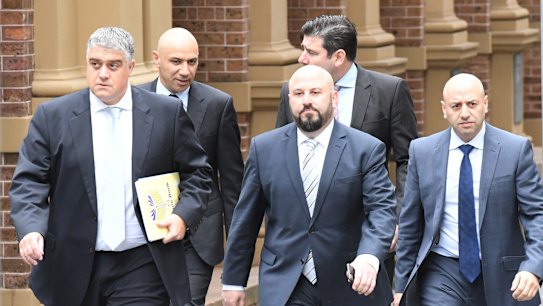 From left, lawyer Nick di Girolamo, Moses Obeid, Eddie Obeid jnr, lawyer Tim Breene (back) and Paul Obeid at the Supreme Court last year.