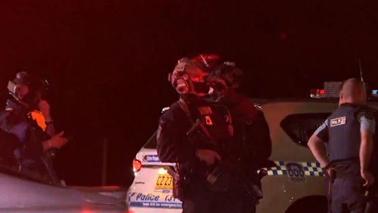 The 60-year-old father who allegedly randomly fired up to 50 shots from his unit window in Sydney's inner west has been pictured in custody as he awaits charges.