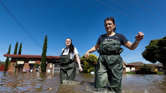  Stephanie and Jo Wilson (right) checking their south Shepparton house.  