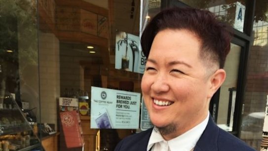 Californian resident A.T. Furuya holding a nonbinary gender court order.