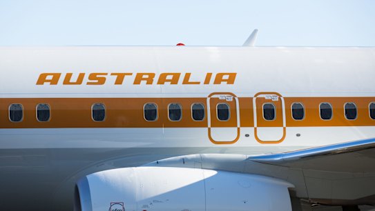 Time warp: Qantas' 75th Boeing 737-800 has been decked out in retro livery.