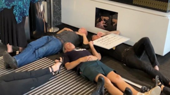 Dozens of climate activists have stormed Dumas House in protest of the Western Australian government's approval of Woodside's North West Shelf gas extension.