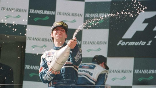 Damon Hill celebrates his win in the Australian Grand Prix in 2006.