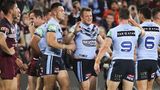 Josh Morris of the Blues scores a try during Game 1 of the 2019 State of Origin series between the NSW Blues and the Queensland Maroons at Suncorp Stadium in Brisbane, Wednesday, June 5, 2019. (AAP Image/Glenn Hunt) NO ARCHIVING, EDITORIAL USE ONLY