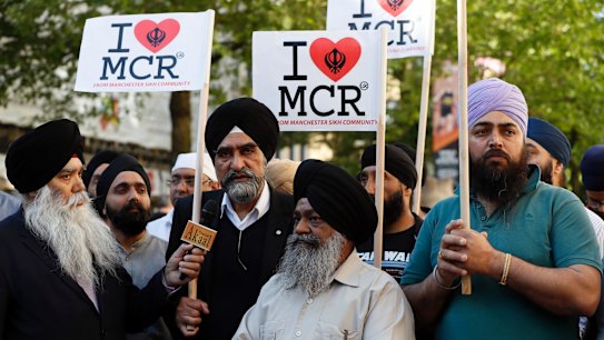 Members of the Manchester Sikh community attend a vigil in Albert Square, Manchester on Tuesday afternoon.