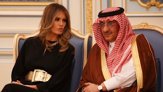Melania Trump talks with Saudi Crown Prince Muhammad bin Nayef. Her appearance was no different to Michelle Obama's two years ago.