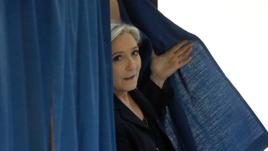 Far-right leader and candidate for the 2017 French presidential election Marine Le Pen exits a polling booth.