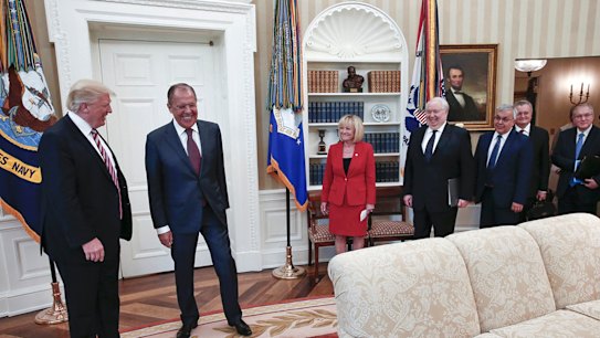 Laughs all round: US President Donald Trump meets with Russian Foreign Minister Sergei Lavrov. Russian ambassador to the US Sergey Kislyak is fourth from left.