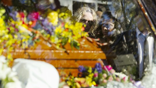 Guests outside the church after the funeral of Myuran Sukumaran.