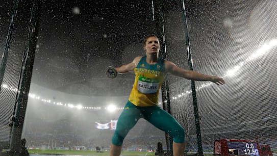 Australia's Dani Samuels throws in torrential conditions at the Rio Games.
