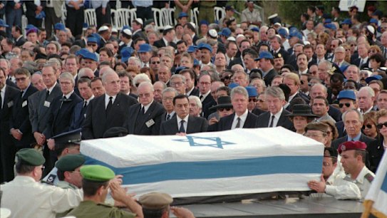 World leaders watch as Yitzhak Rabin is laid to rest in Jerusalem's Mount Herzl Cemetery on November 6, 1995.