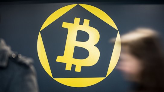 The Bitcoin symbol  at the offices of La Maison du Bitcoin bank in Paris.