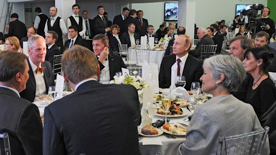 Michael Flynn (centre left) next to President Vladimir Putin at an event celebrating RT in Moscow. Jill Stein, 2016 US Greens candidate, is seen with her back to camera. 